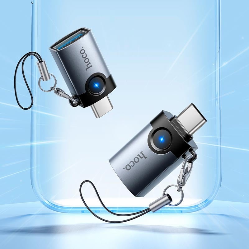 Adaptador HOCO UA46C Victory Tipo C a USB-A 3.0 gris con luz LED