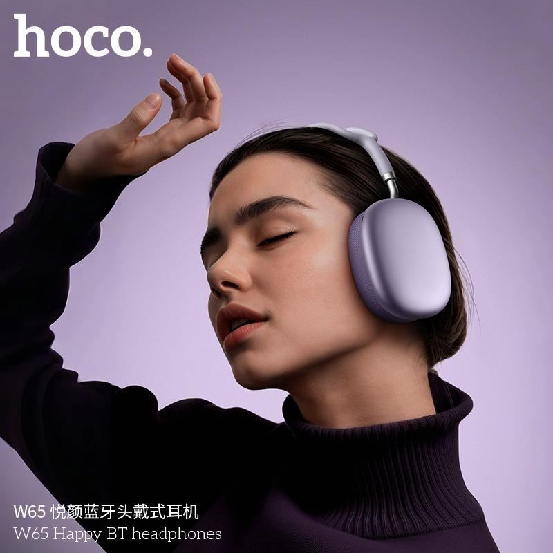 Mujer usando los audífonos de diadema HOCO W65
