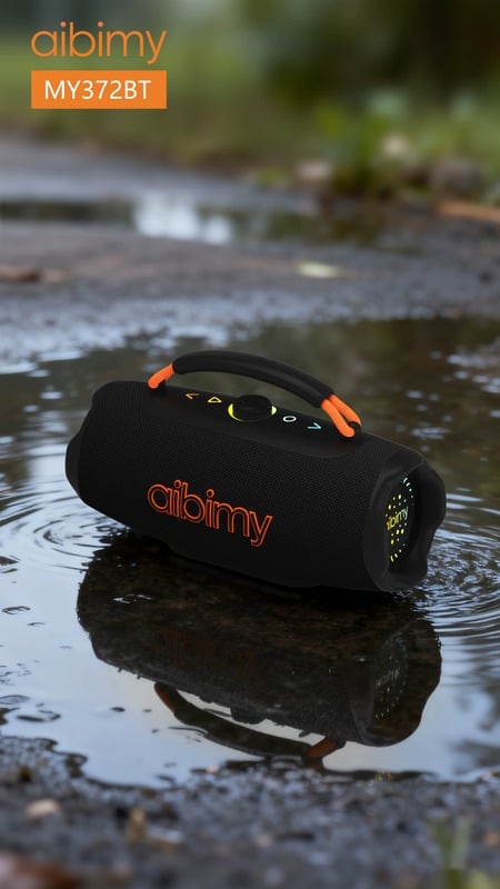 Parlante AIBIMY MY372BT negro y naranja con asa de transporte sobre una superficie de agua