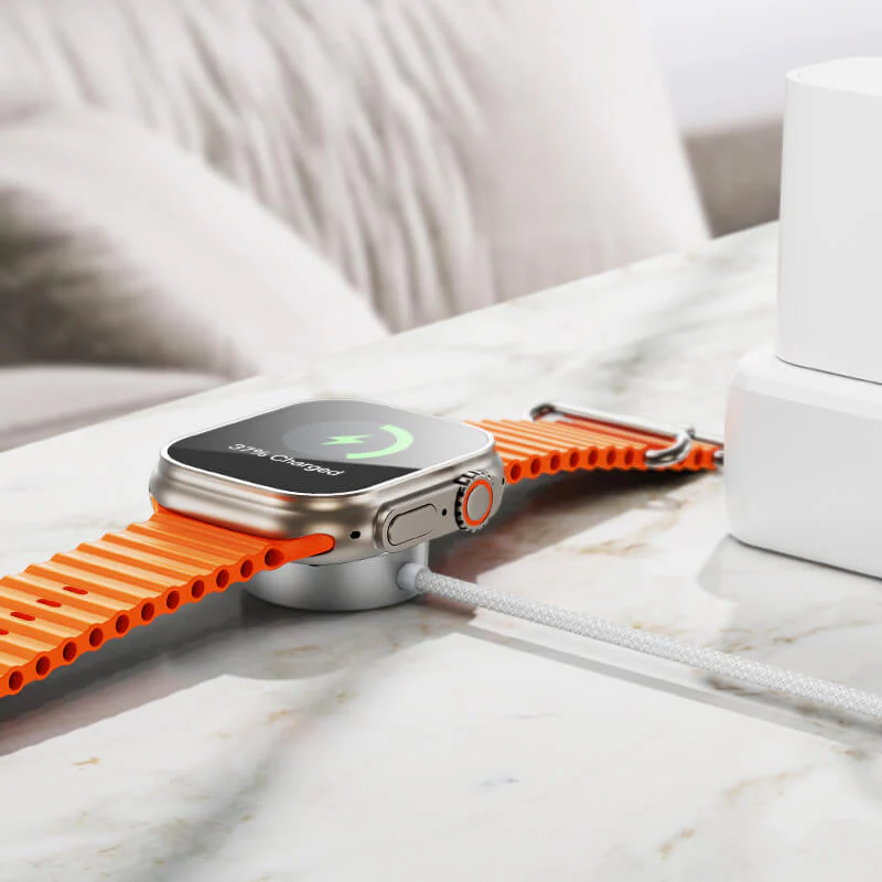 Apple Watch cargando con el HOCO CW59 sobre una mesa